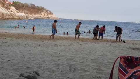 Locals on the beach Huatulco