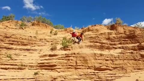 Collab copyright protection - two guys go down sand cliff one fail