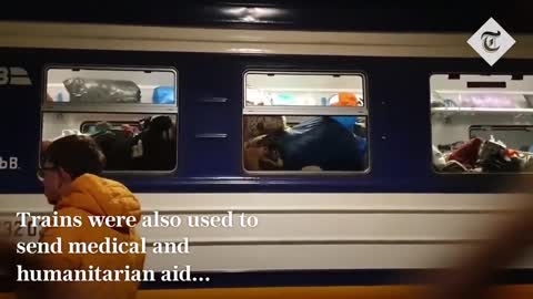 Thousands of Ukrainians flee in packed trains to Poland