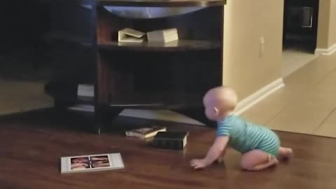 This baby is THRILLED the dog's playing hide-and-seek with him 😂