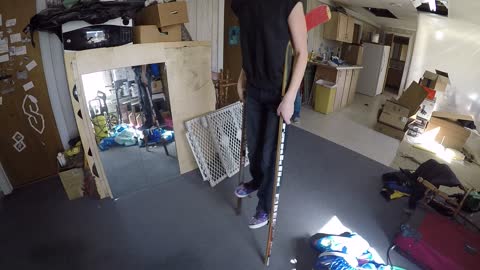 Creative dad builds hockey stick 'stilts' for daughter