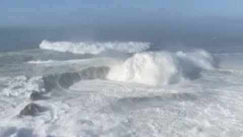 Record breaking waves surfed at Nazare, Portugal