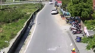 Man Fixing Hair On Scooter Crashes With GF Into Ditch