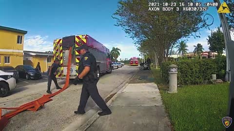 Moment Florida Firefighters Carry Man To Safety After He Starts Motel Blaze
