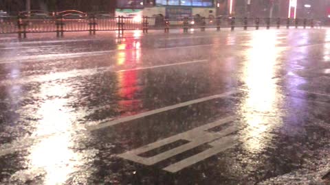 Heavy rain on bus stop