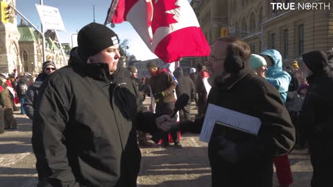 Andrew Lawton speaks with Pastor Henry Hildebrandt at the #TruckersForFreedom rally