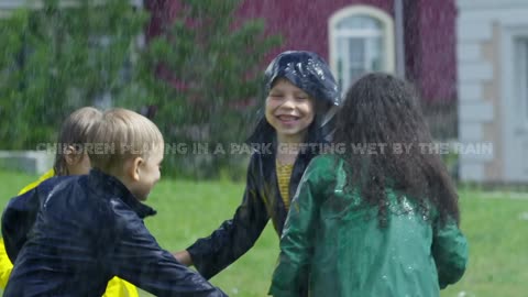 Children Playing In Park Getting Wet By The Rain