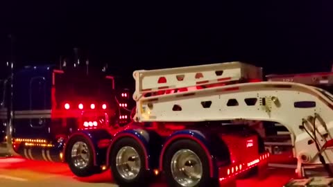 Optimus Prime's team driving at high speed at night