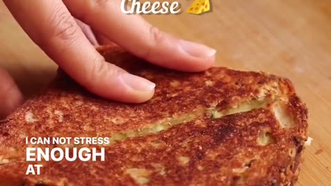 "A Tangy Twist: Grilled Cheese with Green Chutney Delight!"