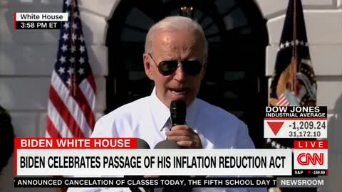 President Biden celebrates his 'Inflation Reduction Act' as the stock market tanks