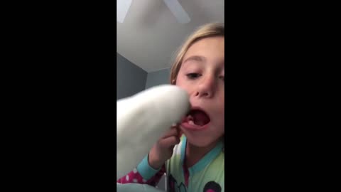 Bird Pulls Out Little Girl's Loose Tooth.