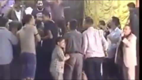 A theater falls in the crowd in a comedy way During the joy of Egypt