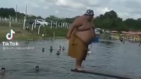 Very fat man jump to water