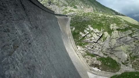 An amazing Ibex clims a dam as it defies gravity.. MUST WATCH