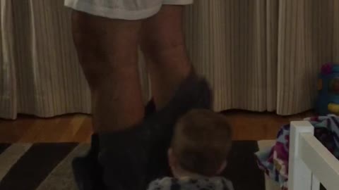 Baby Boy Learning To Walk Accidentally Pulls His Dad's Shorts Off