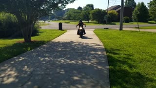 Indian Scout Bobber in the driveway