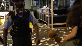 Cop and lady were dancing in festival street food