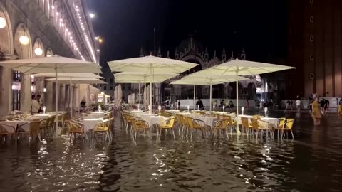 Venice's St. Mark's Square flooded by high tide