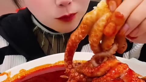 She eating octopus 😐🤤