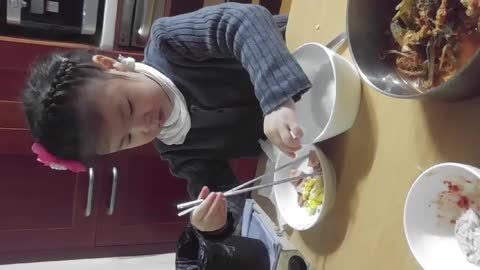3-year-old baby's first chopsticks