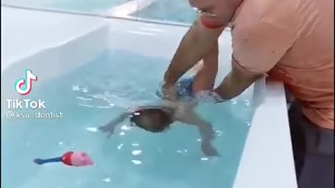 Cute Baby Swimming in pool