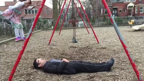 dad Awesome perfects swing stunt at the park