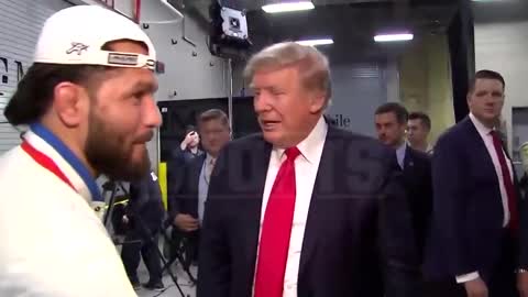 Donald Trump Arriving at UFC 264, Cheered by Fans )