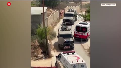 Jewish soldiers in Israel drive with a wounded Palestinian strapped to the hood of a Jeep