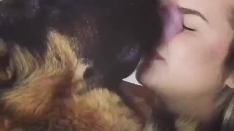 German Shepherd licks owner's entire face