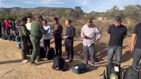 Large groups of migrants , mostly Chinese national men crossing illegally