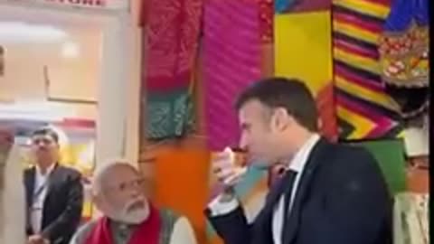 PM Modi & President Macron share light moments over Tea at a local shop in Jaipur