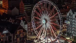 Ferris Wheel City Scene Panning Across Night Time