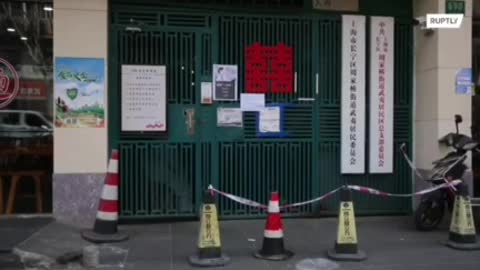 Empty streets of Shanghai on Tuesday after the city reported a new spike