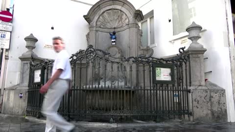 Brussels' urinating boy statue wears NATO outfit