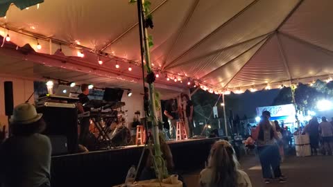 John Velásquez playing guitar at the 2022 Ventura County Greek Festival