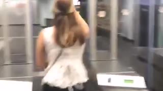 Girl white shirt runs into closing door