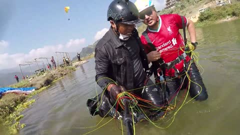 Paragliding Water Touch Ends in Splash