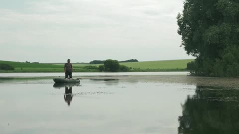 Fisherman uses boat to catch a fish!