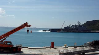 LCAC entering the stern of a LSD class US Naval ship in Okinawa