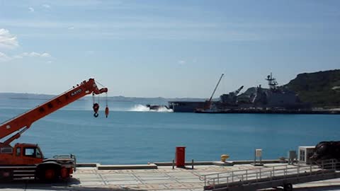 LCAC entering the stern of a LSD class US Naval ship in Okinawa