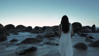 Pritty girl walking on a nice beach