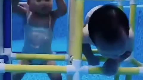 one year old kids are learning to dive
