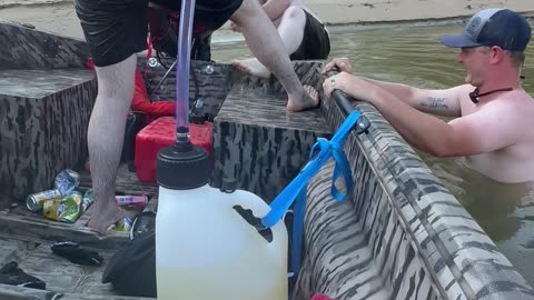 Big Guy Struggles to Get Back Into Boat