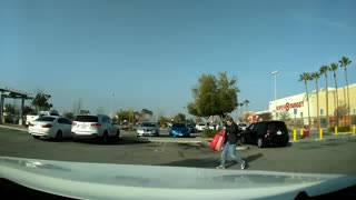 Random guy throws eggs at car for no reason at all
