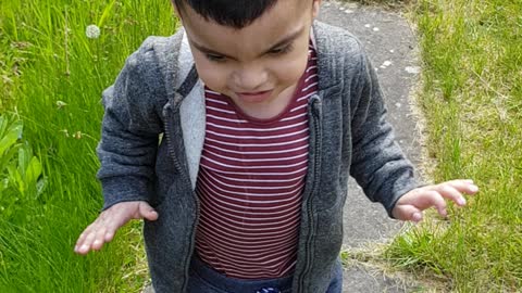 Cute baby walking in Garden