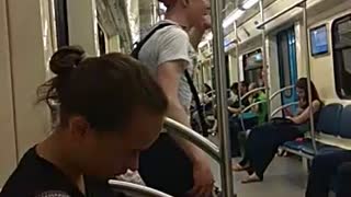 Guy orange hat dancing subway