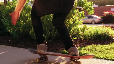 A Skateboarder Doing Exhibition Tricks