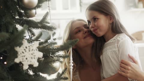 Happy family at Christmas near the Christmas tree