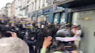 Clashes between Macron's minions and protesters.