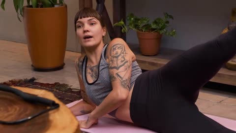 Woman giving an online fitness class